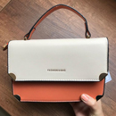 Cartera jessi modelo crema/naranja